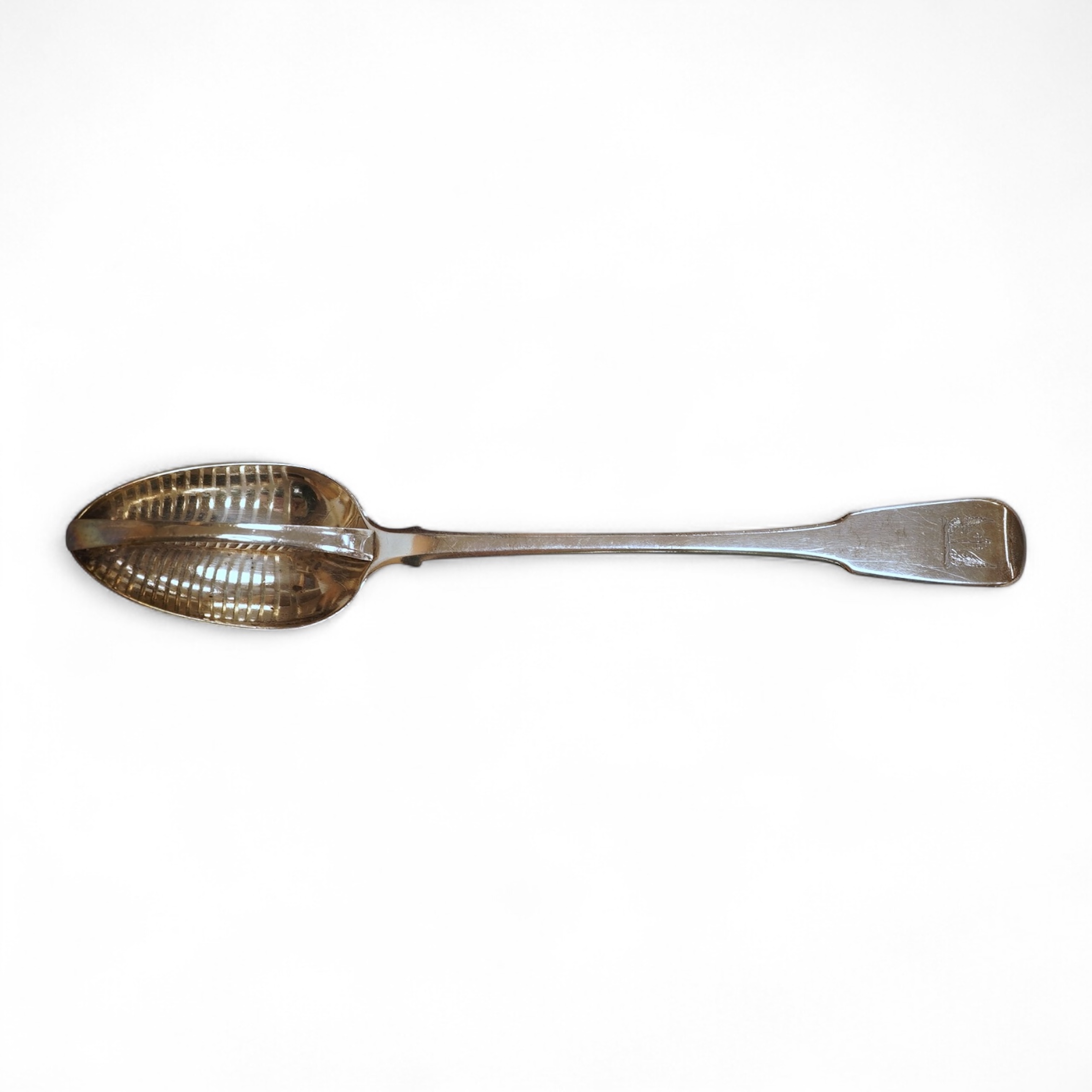 A George III silver fiddle pattern basting/strainer spoon, by Eley & Fearn, London, 1805, 30cm, 5.5oz.